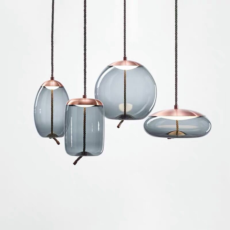 Lampa wisząca Hempoire w kolorze różowego złota