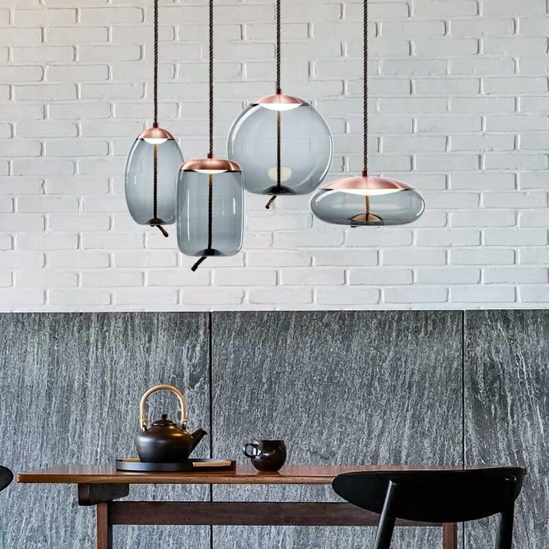 Lampa wisząca Hempoire w kolorze różowego złota
